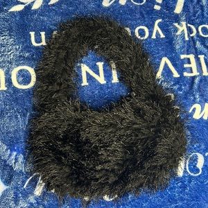 Black furry purse